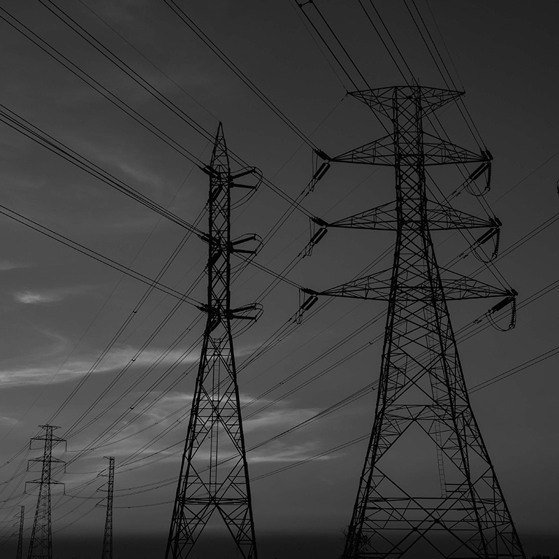Power grid transmission towers and conductor lines
