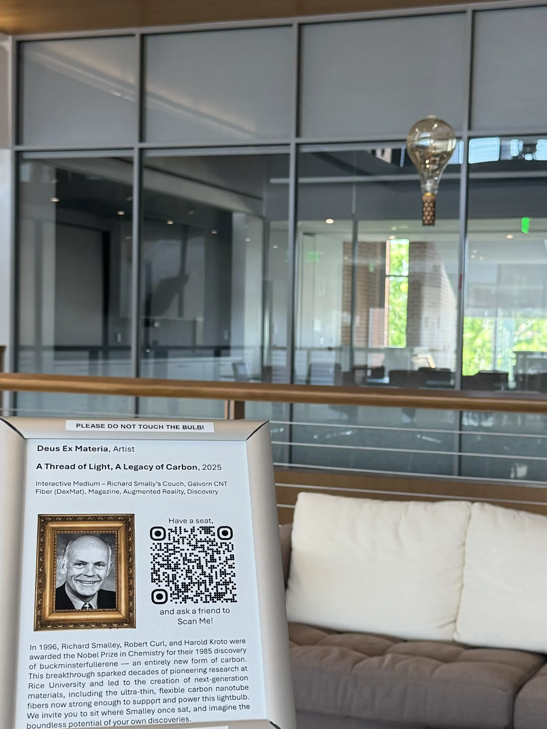 Richard-Smalley-Galvorn-lightbulb-sign Honoring Richard Smalley: A lightbulb "floating" above Richard Smalley's couch, simultaneously suspended and powered by Galvorn carbon nanotube fiber.